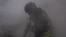 Ukraine -- Rescue workers fighting fire in Sumy region after a Russian strike, 15May2025 