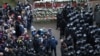 Belarus - Belarusian law enforcement officers surround demonstrators during a rally to reject the presidential election results in Minsk, November 15, 2020