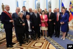 Валерий Гергиев (второй слева) на церемонии вручения госнаград в Кремле. Май 2024